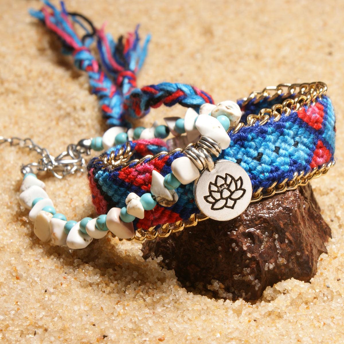 Full view of a turquoise and white shell anklet with a lotus charm, embodying a blend of tranquility and natural elegance.